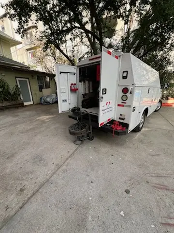 Magnet Plumbing service vehicle on-site for Grease Trap Cleaning in Annie Laurie Gardens